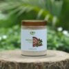 Ashwagandha 250 GM jar on a wooden stump with green foliage - Eco Foods