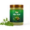 Moringa Powder 250 G jar with fresh moringa leaves - Eco Foods