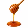 Sundarban wild comb honey dripping from a wooden dipper - Eco Foods